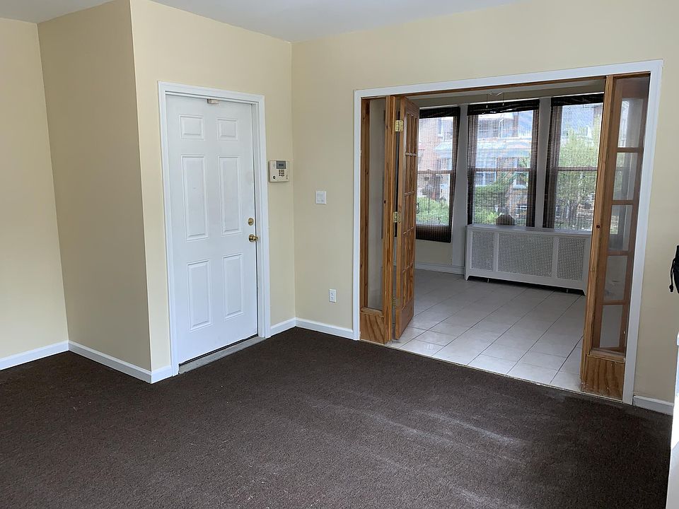 Living room and opening to front bonus room