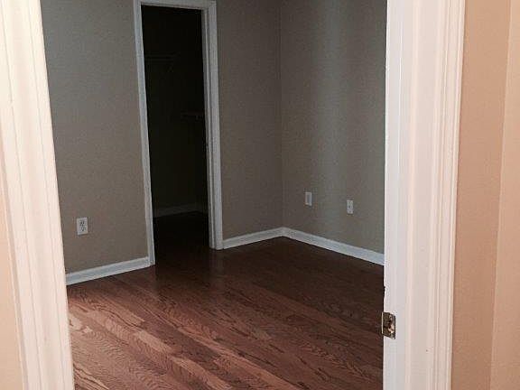 bedroom with hardwood floors