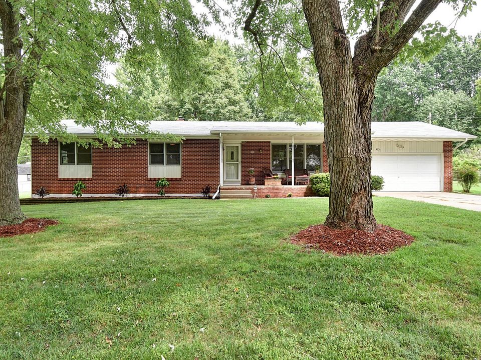Beautiful home with shade trees