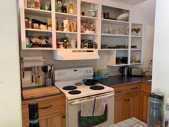 Kitchen with newer cabinets.