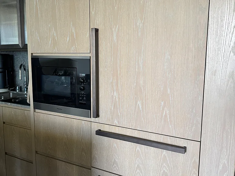 High end Miele fridge and freezer with microwave and food storage