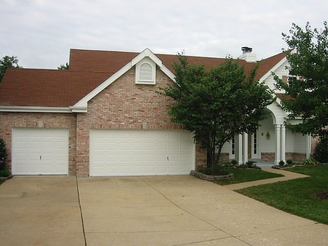 Atrium ranch with 3 car garage.