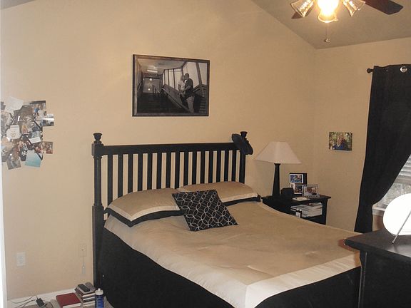 View of vaulted master bedroom, walk-in closet.
