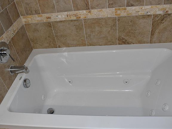 Whirlpool tub in Master bathroom
