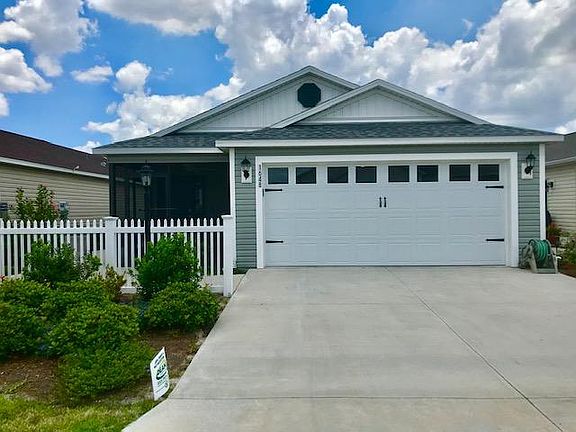 Front with 2 car garage