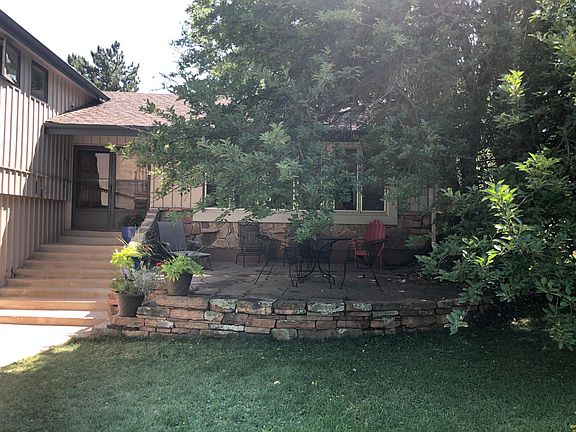 Beautiful flagstone front patio with views of the mountains