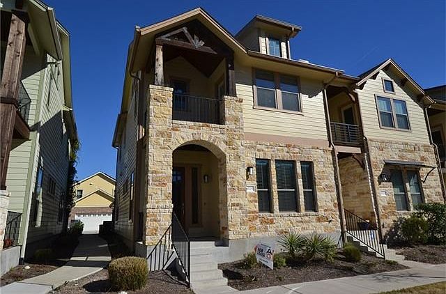 Exterior Front; End unit with no attached neighbors on 3 sid