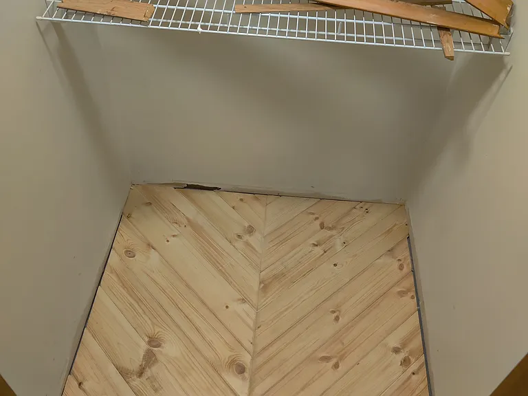 1 of 2 walk in closets for master bedroom.