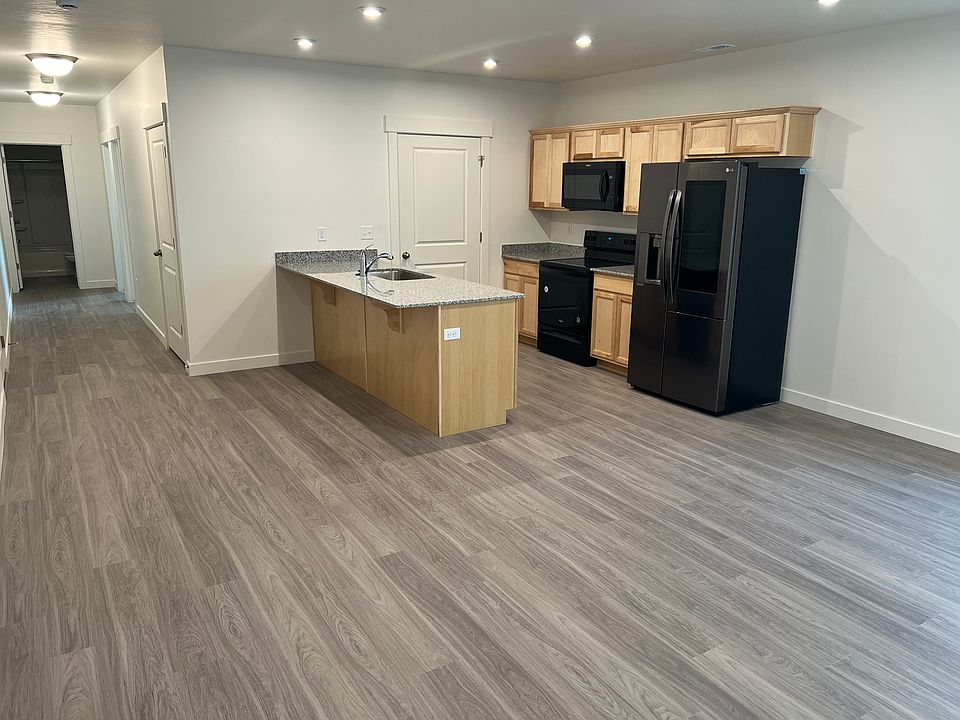 Corner of Kitchen and hallway towards rooms and bathroom