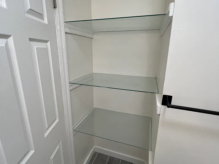 Bathroom shelving/storage area.