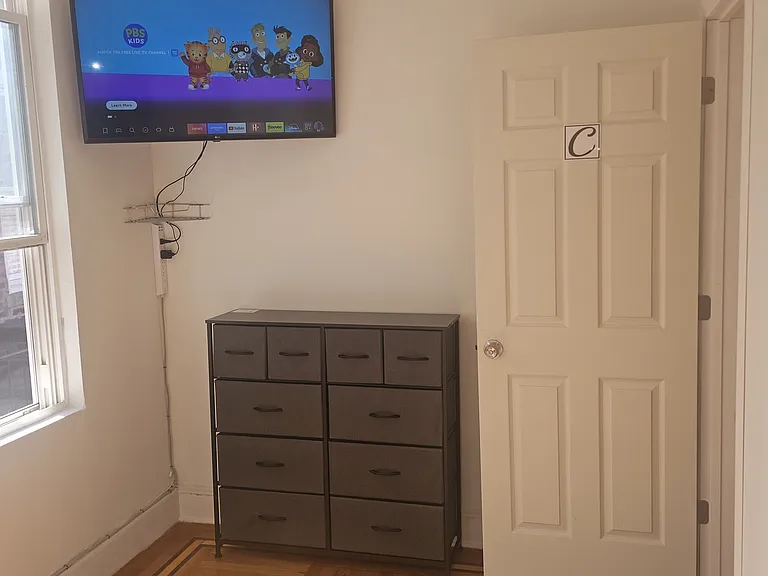 Looking from Inside Room C. 42-inch mounted TV with 4k Max Firestick.