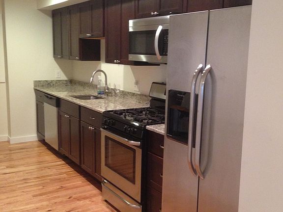 Kitchen with granite counter, stainless steel appliances