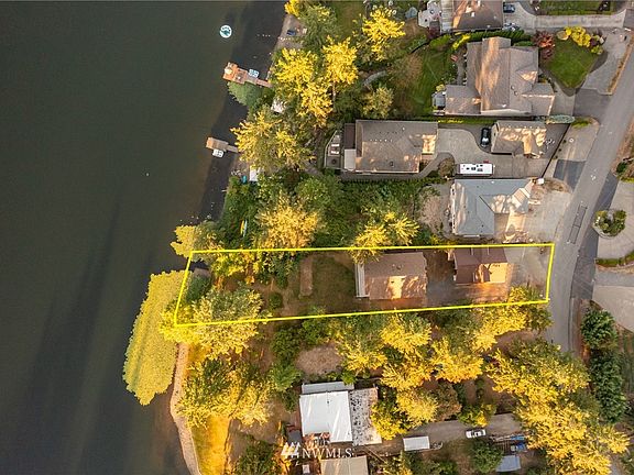 Rectangular lot from the road to the water - private drive, private setting. Brand new construction next door adds value - homes selling for more than a $1M on the water