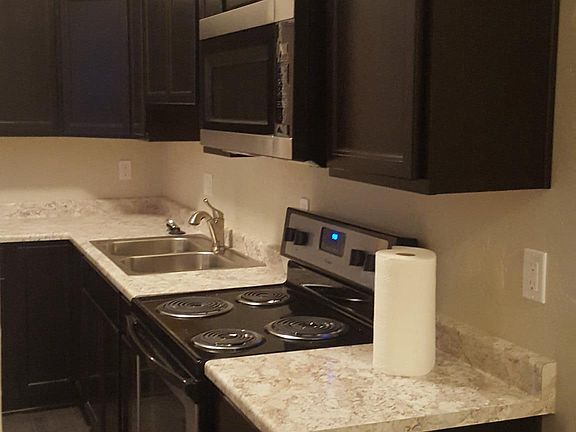 New Cabinets, Floor, Counters, Microwave, Stove, Sink, dispo