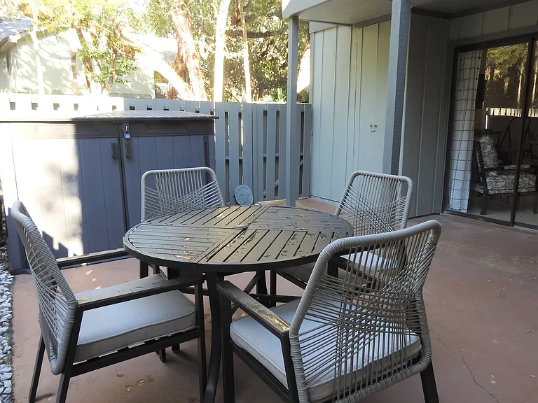 Private enclosed patio with views of the maritime forest all around.