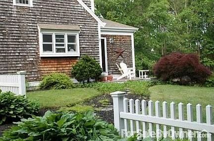 Side entrance.
						:
						Enters at mud room. Nice sun deck for morning coffee.
