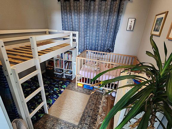 This small room is the office. The child size beds will be removed and I will post a new photo once this is done.