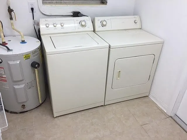 Laundry Room with Full Size Washer and Dryer