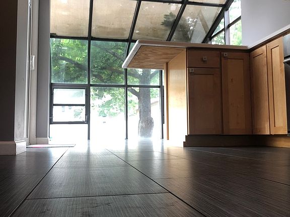 Kitchen overlooking backyard