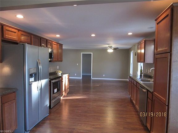 The kitchen offers nice natural light and interior recessed lighting. With the eat in area at one end and the living room at the other it will be easy to hang out with the family or throw the perfect party for friends.