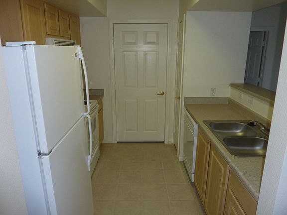 Kitchen, Closed door is laundry closet, washer, dryer, refrigerator included.