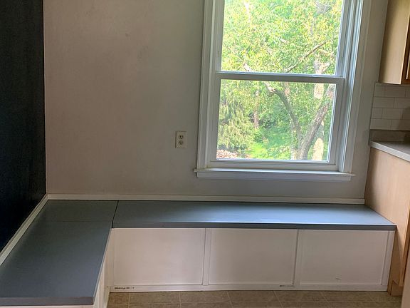 Built-in banquette provides plenty of seating in the kitchen, as well as extra storage.
