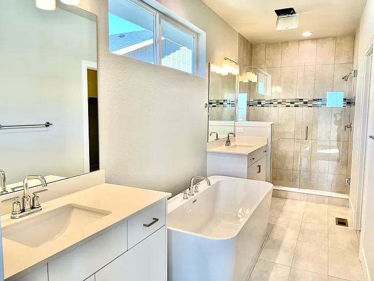 Master Bath with large walk in closet and separate toilet room.