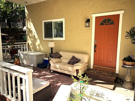 The front door protected with a roofed and enclosed patio area. This provides a safe area for small kids and pets separated from the larger yard.