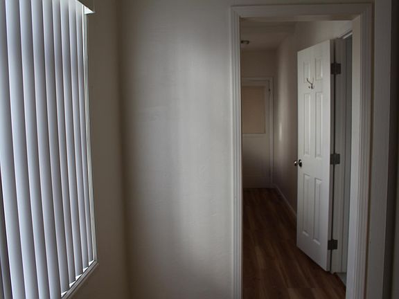 Office area looking towards rear entrance/kitchen area