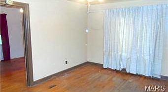 Dining room, looking into the second bedroom.
