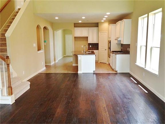 The open design of this plan is perfect for entertaining or enjoying quiet evenings at home!