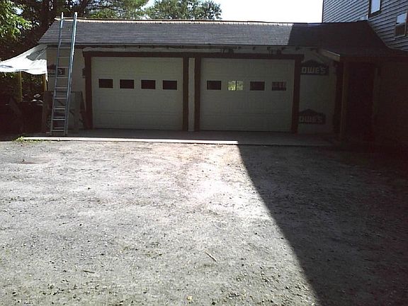 Two car garage attached to the house.  In the process of siding.