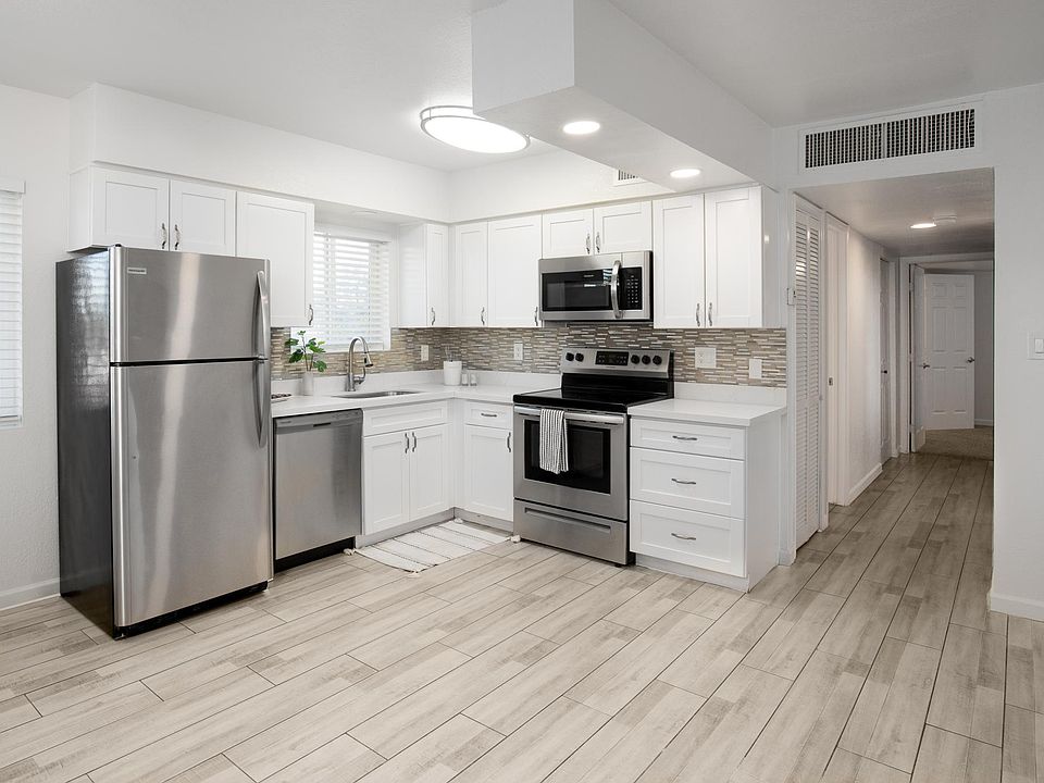 All of our homes are unique in layout but upgraded with the same beautiful esthetic. In this photo Unit #9 shines with it's stainless steel appliances.