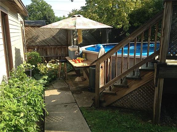 Pool, garden area in a completely fenced in private back yard