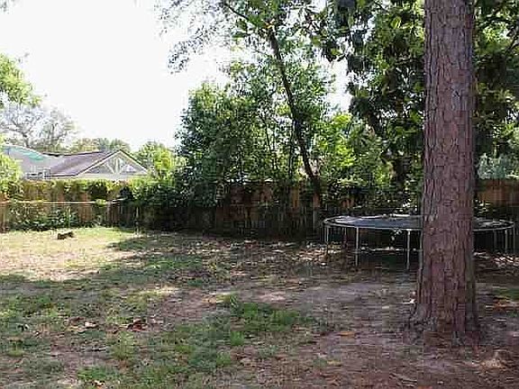 Large, fenced back yard