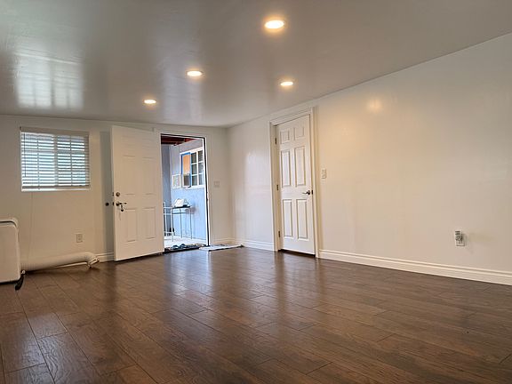 Spacious living room with new laminate flooring