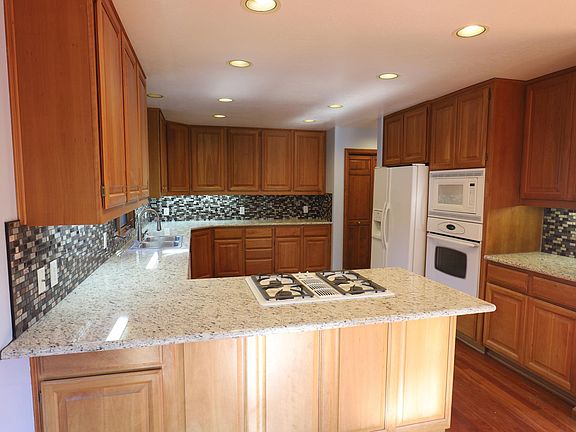 Kitchen photo taken from breakfast nook