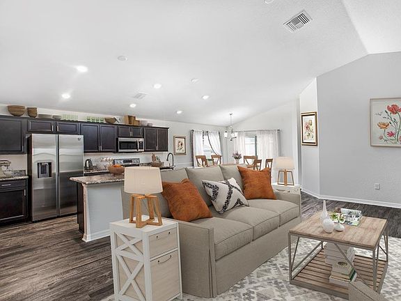 You will love the sunny and open living area with your choice of finishes - Parsyn home plan by High