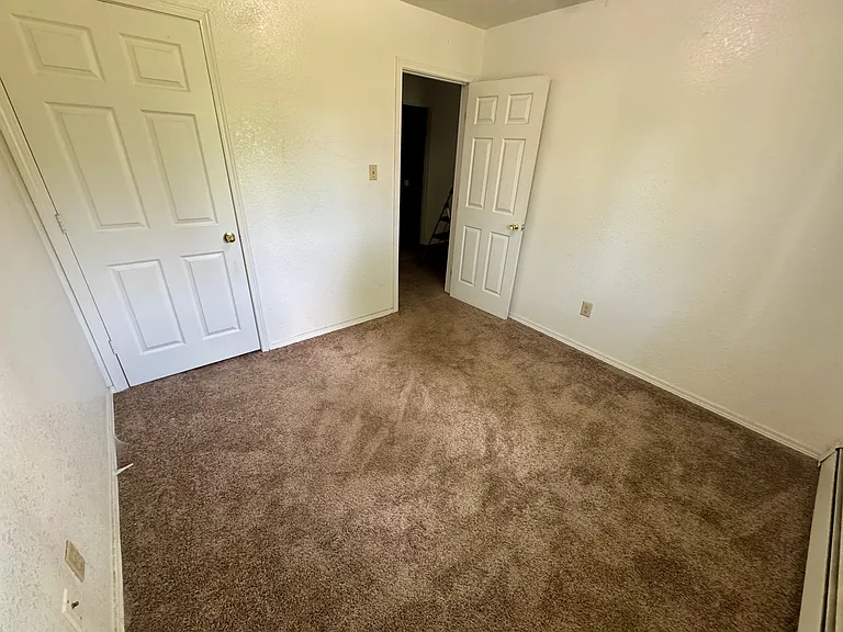Bedroom 2. Each bedroom has its own closet.