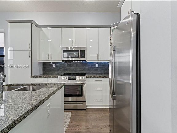 4th image of 9786 W 34th Ave #0