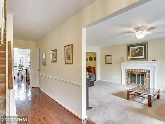 Hall leading to living room & kitchen