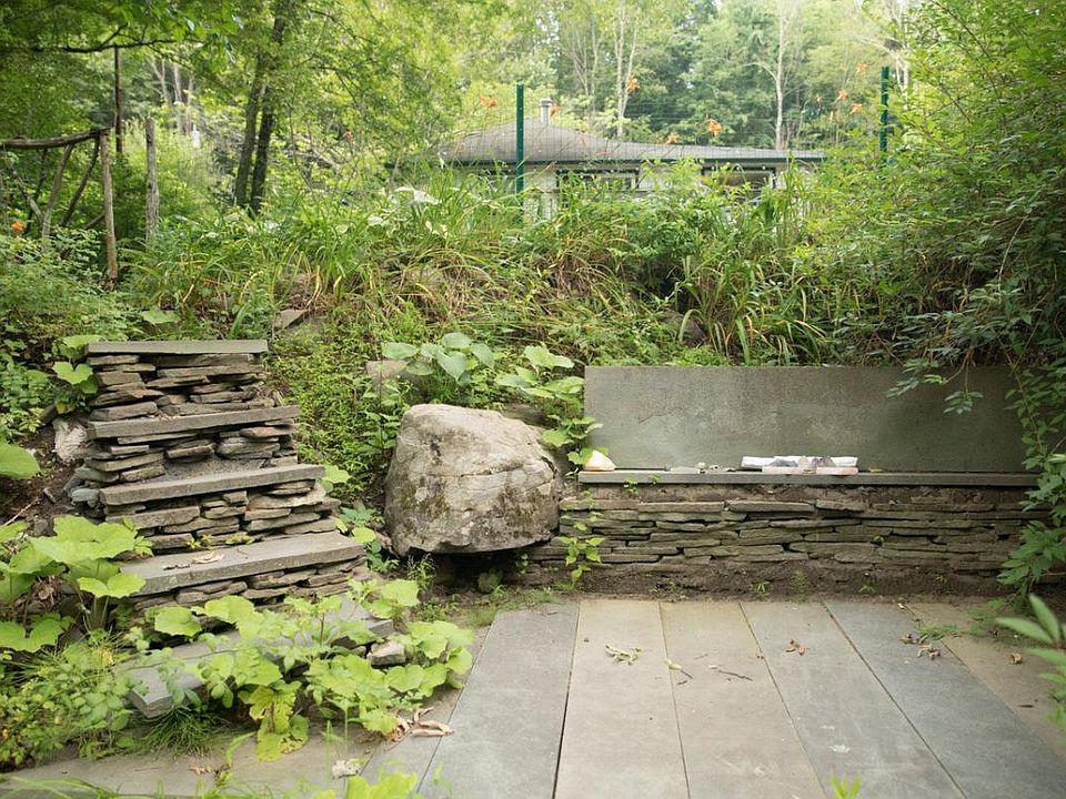 stone meditation terrace on with garden on the water, a perf