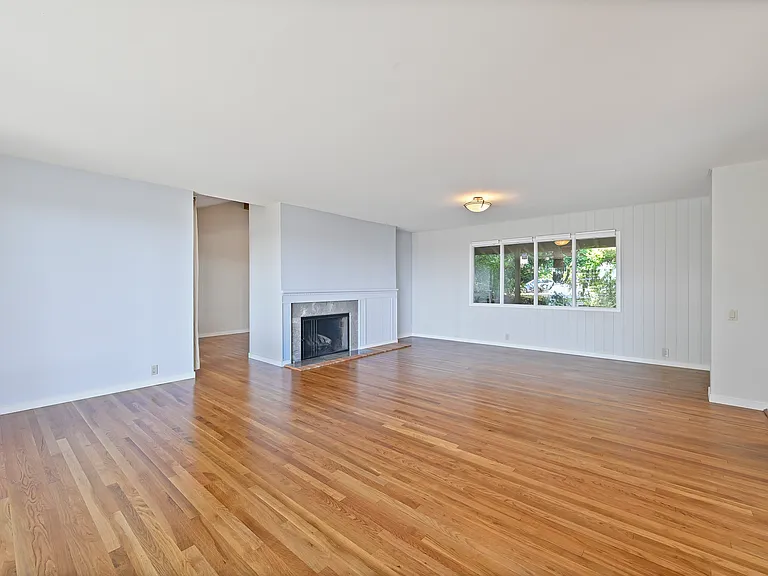Main Living room with another Den behind the fireplace