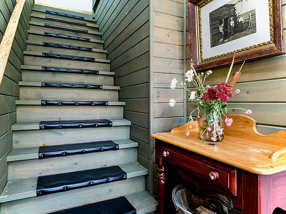 A private entrance to your space and stairwell lead to the coach house space.