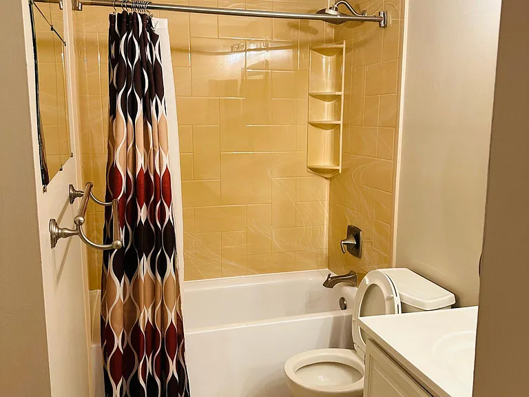 Bathroom with new shower walls and tub