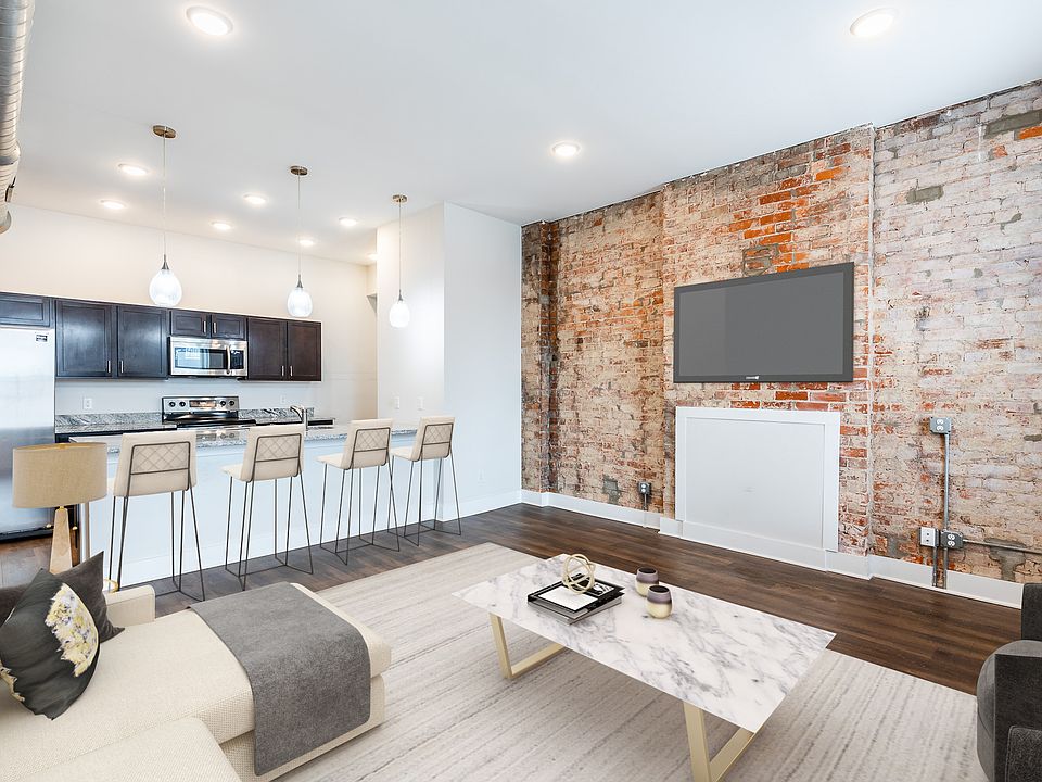 Spacious 2 bedroom with tall ceilings and exposed brick. Large windows lets in lots of light.