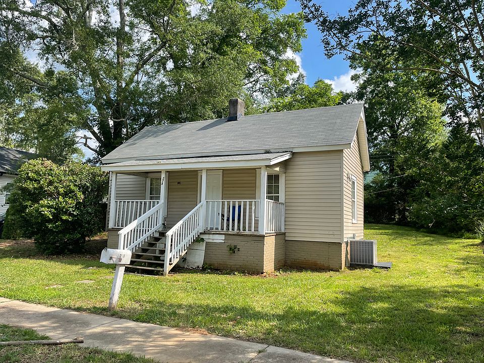 One bedroom bath house sitting on quarter acre lot