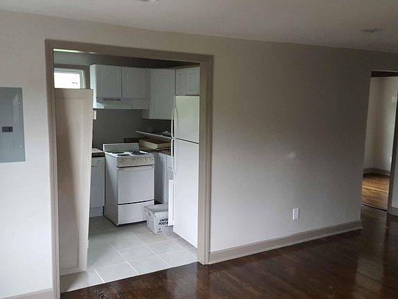 front o fhouse in LR to kitchen and back bedroom