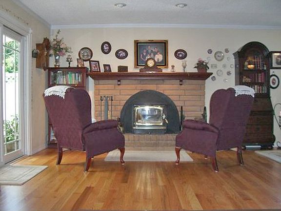 PLEASANT SITTING AREA WITH FIREPLACE INSERT