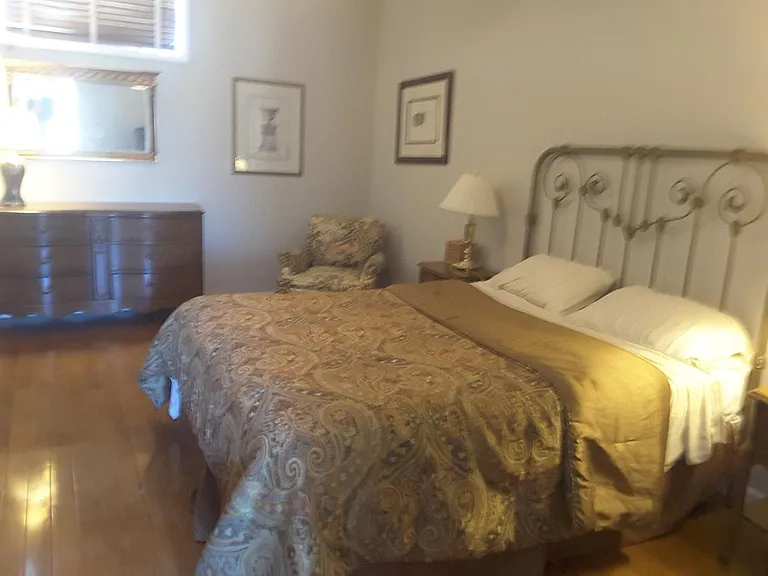 Spacious bedroom, beautifully furnished with a queen sized bed.